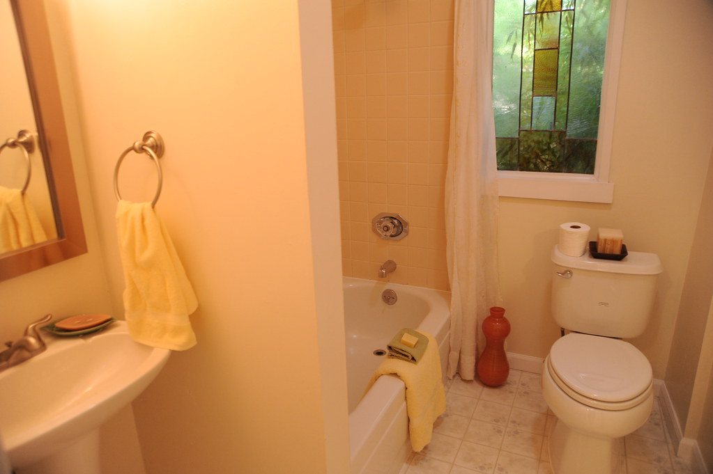 Bathroom before a tub-to-shower concept
